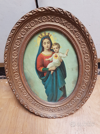 Antica cornice ovale decorata