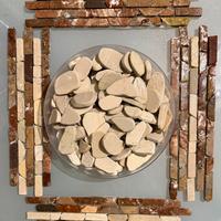 Ciottoli di fiume  bianchi sfusi, ma tagliati.