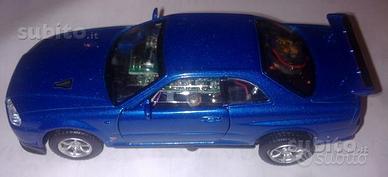 Nissan skyline gt-r modellino elettrico radiocoman