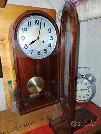 orologio a pendolo da muro