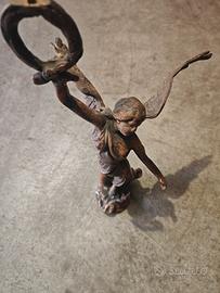 statua 