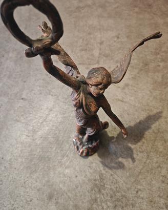 statua 