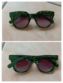 Occhiali da sole con una montatura verde fantasia