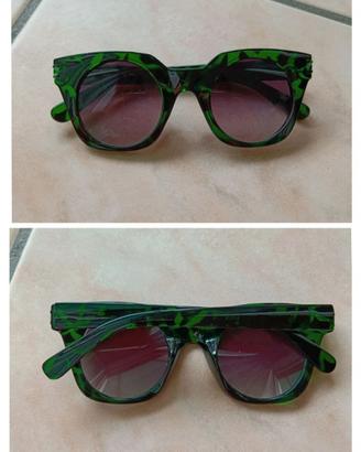 Occhiali da sole con una montatura verde fantasia