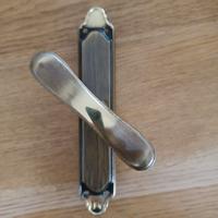 Maniglia per finestra