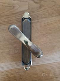 Maniglia per finestra