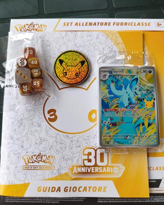 nidorina 30th + guida allenatore,dadi e moneta