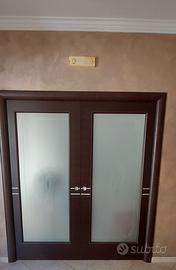 porta a due ante scorrevole