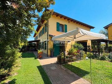 PORZIONE DI CASA CON AMPIO GIARDINO PRIVATO