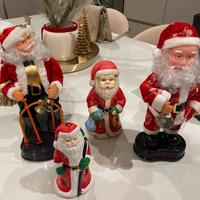 Babbo Natale porta candele e babbo Natale natalizi