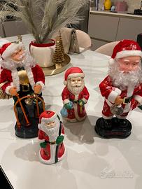 Babbo Natale porta candele e babbo Natale natalizi