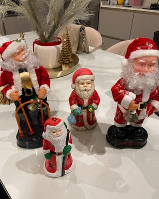 Babbo Natale porta candele e babbo Natale natalizi