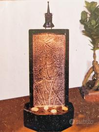 Piccola fontana con luce