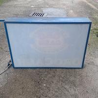 insegna luminosa per negozio