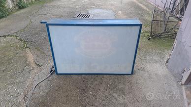 insegna luminosa per negozio