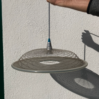 Due lampade a sospensione Artemide