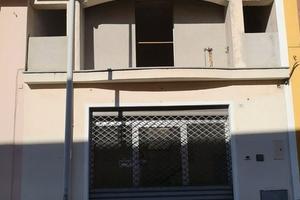 Negozio / magazzino con appartamento