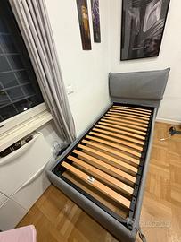 Letto singolo imbottito grigio con contenitore