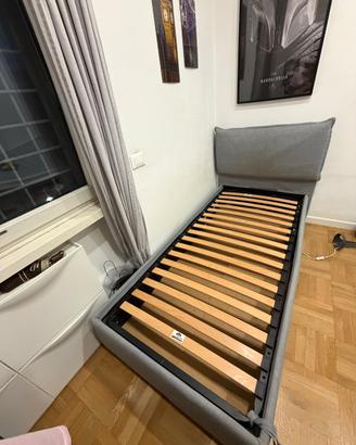 Letto singolo imbottito grigio con contenitore