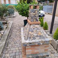 barbecue rivestito in pietra e mattoni