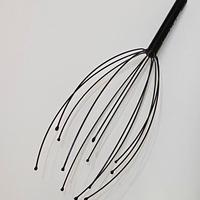 Massaggiatore per cuoio capelluto
