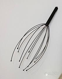 Massaggiatore per cuoio capelluto