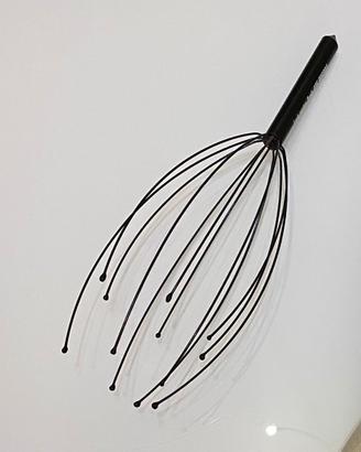 Massaggiatore per cuoio capelluto
