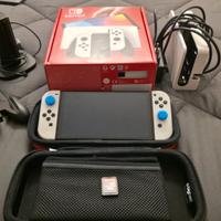 Nintendo Switch OLED + 2 coppie Joy-Con + Dock + P