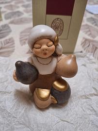 Venditrice anfore  presepe  thun.