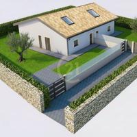 Villa accorpata in costruzione + spazio esterno