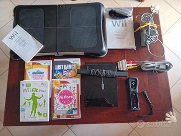 Nintendo Wii + Wii Fit Board + 4 giochi originali 
