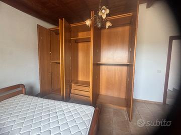 Camera matrimoniale in legno massello