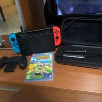 nintendo switch +cover+un gioco