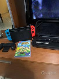 nintendo switch +cover+un gioco