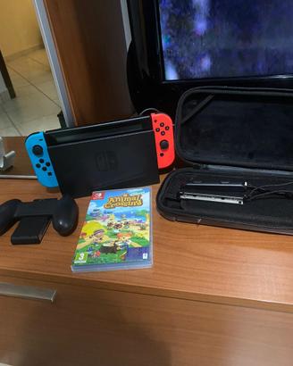 nintendo switch +cover+un gioco