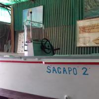 Barca open in legno con motore fuoribordo