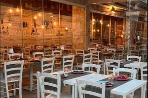 Locale con giardino privato