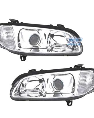 FARI PER OPEL OMEGA 94-99 LENTE CROMATA CON FONDO 