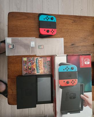 Nintendo switch con 3 giochi+cavi