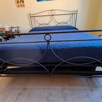 Contorno letto in ferro battuto