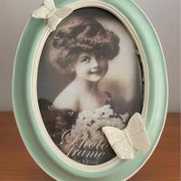Cornice portafoto verde con farfalle