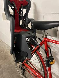 Seggiolino posteriori a sgancio rapido