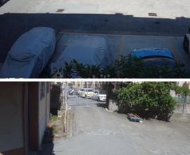 Posti auto scoperti in piazzale privato REBOCCO