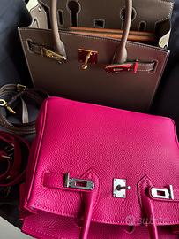 Due borse a mano in cuoio donna fucsia e fango