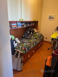 Armadio a ponte con letto