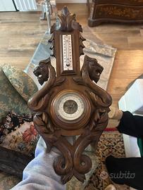 Barometro aneroide e termometro.