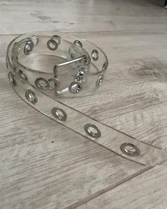 Cintura trasparente con occhielli