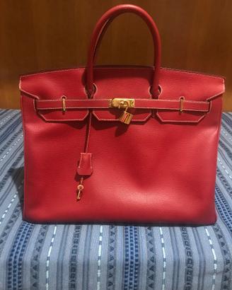 Borsa strutturata rossa con lucchetto e chiave