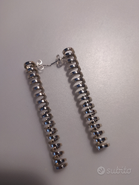 Orecchini in acciaio lucido a forma di spirale