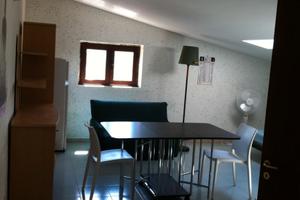 Bilocale ammobiliato, con posto auto condominiale